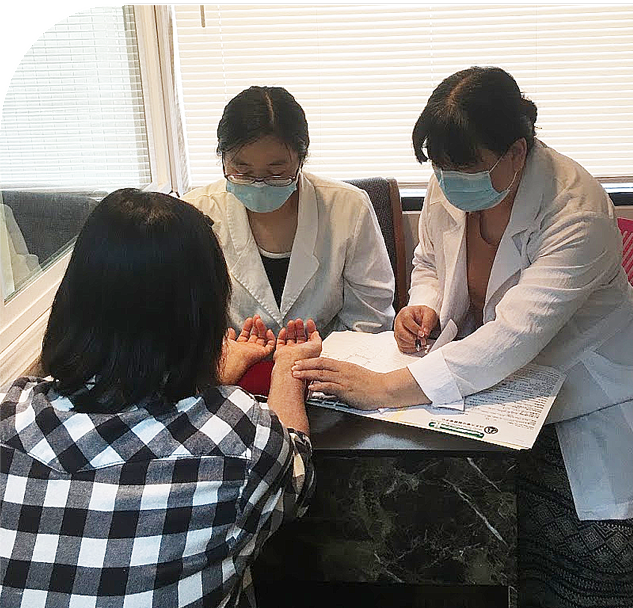 Acupuncture and Herbal Medicine MSAHM program — student training in TCM treatment at Whitewater, an acupuncture school in San Jose California
